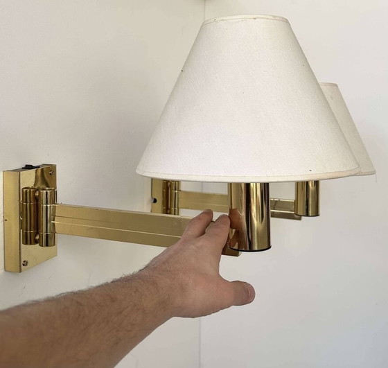 Image 1 of 2X verstelbare wandlampen in massief messing - Zweden 1970