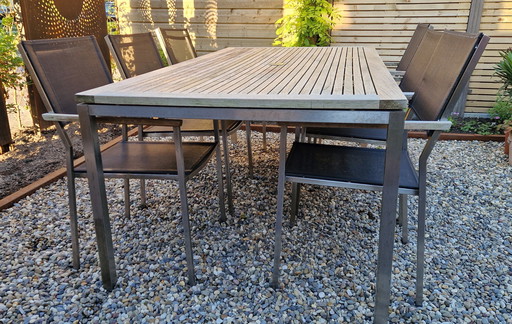 6x Gloster tuinstoelen en 1x Gloster tuintafel