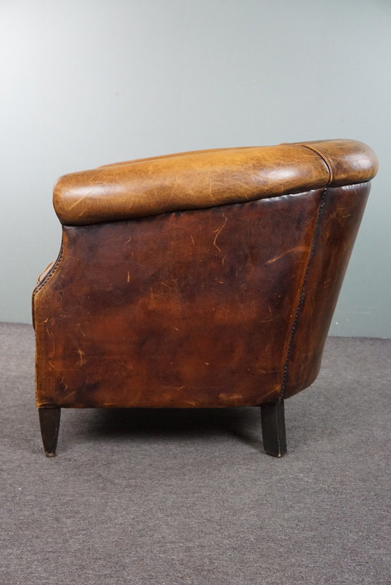 Image 1 of Schapenleren clubfauteuil met gebruikssporen