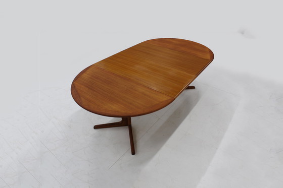 Image 1 of Vintage Deense ronde uitschuifbare eettafel jaren 60