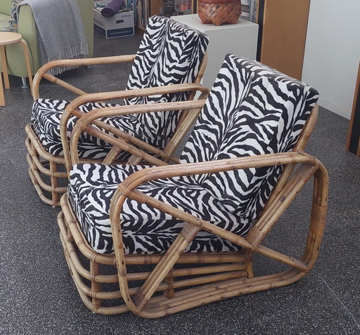 2x Rotan lounge stoelen