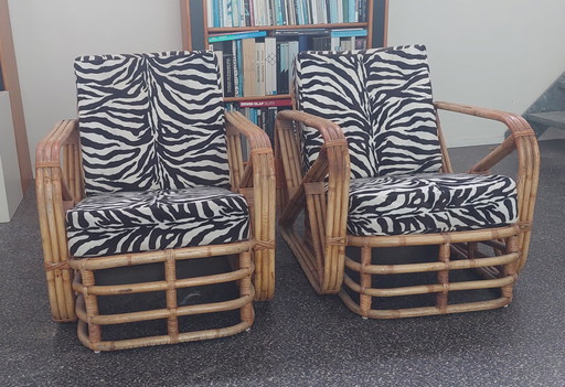 2x Rotan lounge stoelen