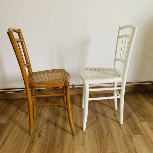 Paar bijpassende vintage stoelen met rieten bekleding