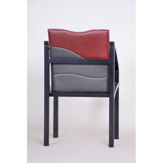 Image 1 of Vintage zwart en rood leren fauteuil, jaren 1970