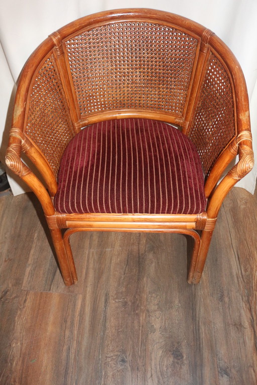 Vintage rotan stoel met fluwelen zitting