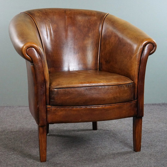 Image 1 of Schapenleren clubfauteuil, in goede staat 