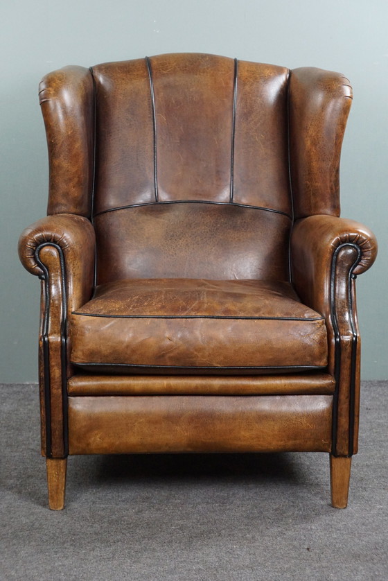 Image 1 of Sprekend gekleurde schapenleren oorfauteuil 