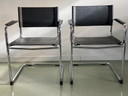 2x Vintage zwarte buisframe stoelen