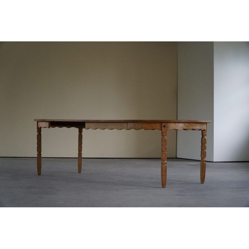 Deense vintage ronde eettafel in massief eikenhout met twee verlengstukken, jaren 1960