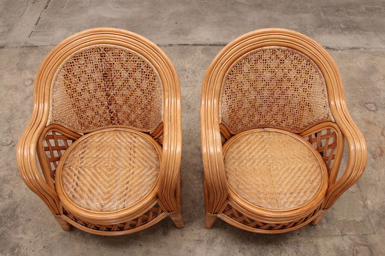 Image 1 of Franse Bohemian set van 2 Bamboe stoelen jaren 60.