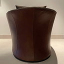 Klassieke Natuzzi fauteuil met bijpassende hocker + 2 kussens