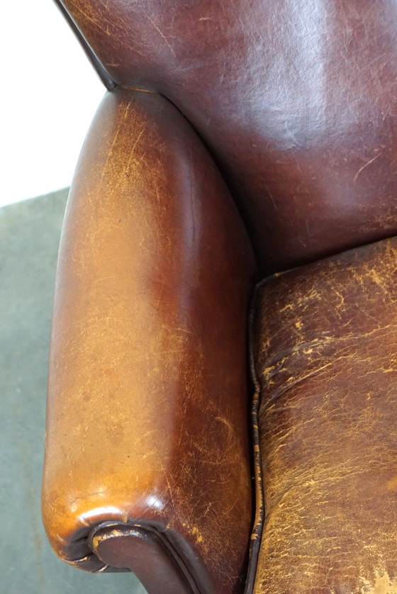 Image 1 of Schapenleren fauteuil met patina