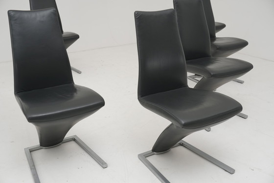 Image 1 of Rolf Benz 7800 stoelen 8 st. Antraciet lederen sledestoel