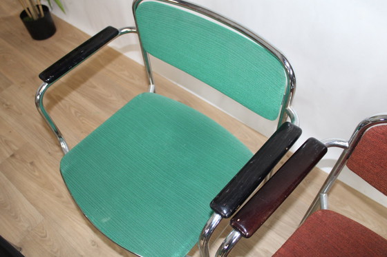 Image 1 of 6 Vintage stapelbare stoelen chroom staal en stof 1960 Zweden