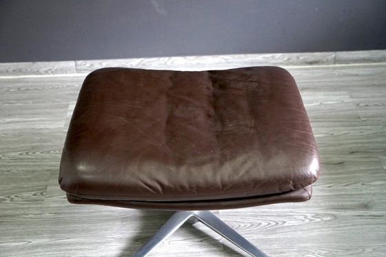 Image 1 of Vintage leren fauteuil met poef, set van 2