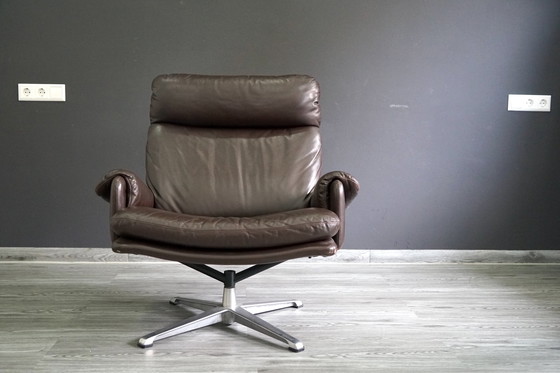 Image 1 of Vintage leren fauteuil met poef, set van 2