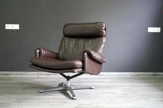 Image 1 of Vintage leren fauteuil met poef, set van 2