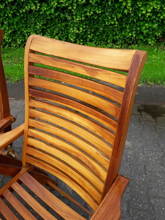 Image 1 of 2 Sunyard Corby teak standenstoelen met voetenbankjes NIEUW