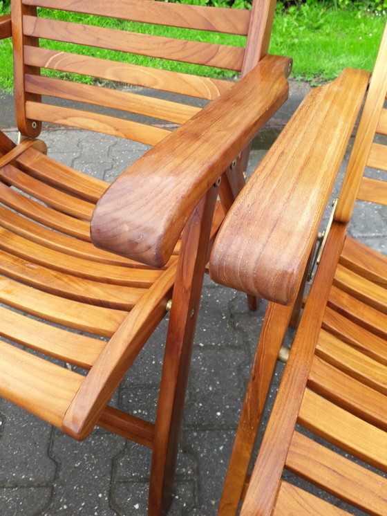 Image 1 of 2 Sunyard Corby teak standenstoelen met voetenbankjes NIEUW