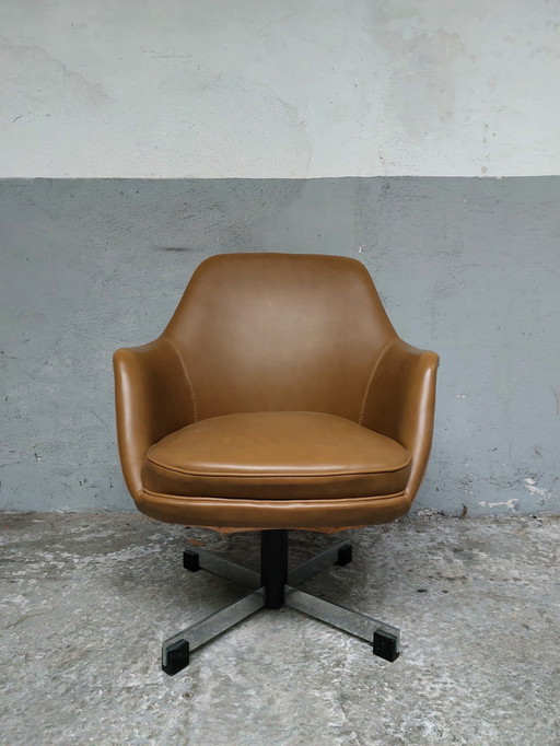 Vintage mid-century swivel design armchair