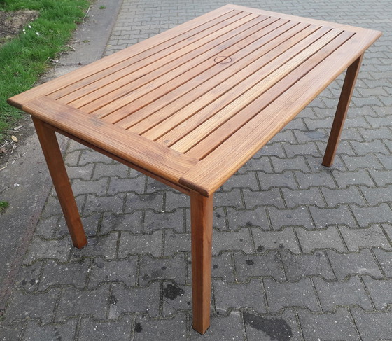 Image 1 of Gloster teakhouten tuintafel 134 x 81 cm