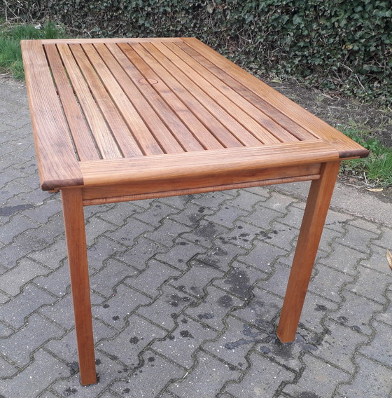 Image 1 of Gloster teakhouten tuintafel 134 x 81 cm