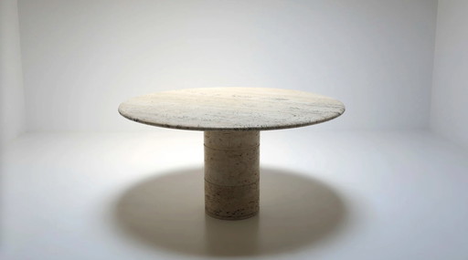 Round travertine dining table