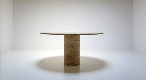 Round travertine dining table