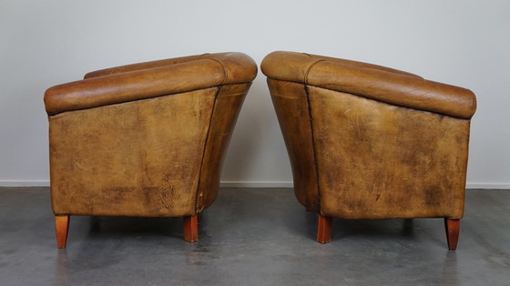 Image 1 of 2 x schapenleren clubfauteuils met een vintage look