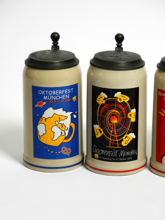 Image 1 of Negen ongebruikte originele Munich Oktoberfest bierpullen met zware tinnen deksels van 2001 - 2009