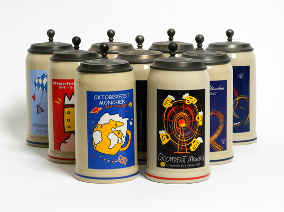 Image 1 of Negen ongebruikte originele Munich Oktoberfest bierpullen met zware tinnen deksels van 2001 - 2009