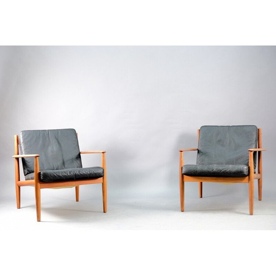 Image 1 of Paar vintage teakhouten en zwart leren fauteuils van Grete Jalk voor France et Søn