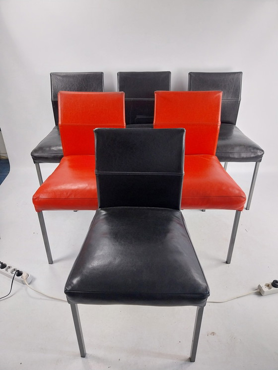 Image 1 of 6 KFF leren eetkamerstoelen model Texas 4 zwart 2 rood