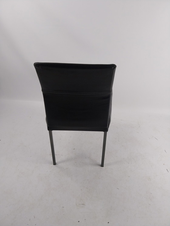 Image 1 of 6 KFF leren eetkamerstoelen model Texas 4 zwart 2 rood