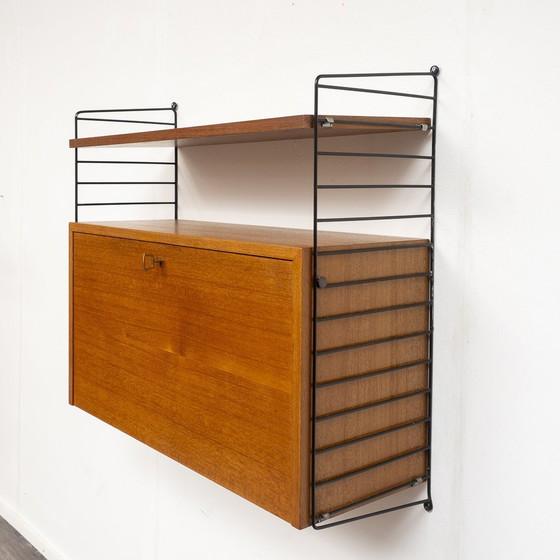 Image 1 of 60s wandplank String, teak, met secretaire container