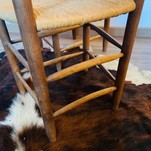 Paar vintage massief houten rieten stoelen