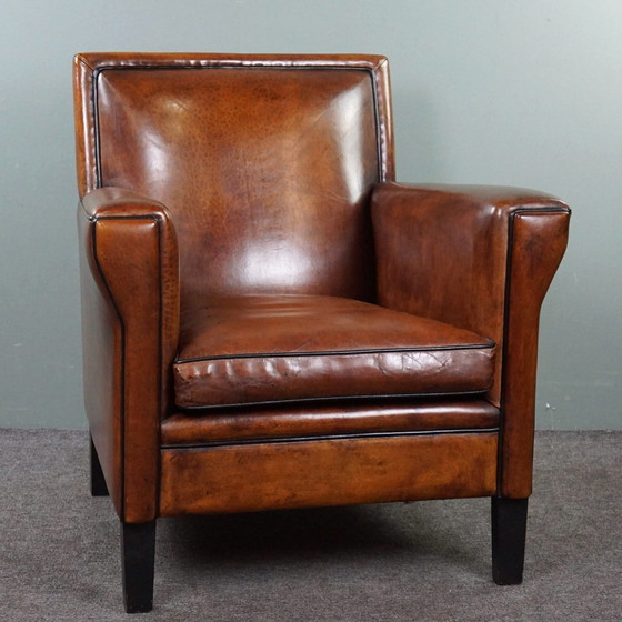 Image 1 of Schapenleren fauteuil in ArtDeco stijl met warme kleuren