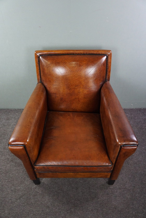 Image 1 of Schapenleren fauteuil in ArtDeco stijl met warme kleuren