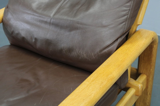Image 1 of 1970 L. Olsen & Søn Paar fauteuils in eiken en leer, Denemarken