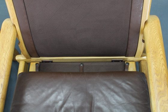 Image 1 of 1970 L. Olsen & Søn Paar fauteuils in eiken en leer, Denemarken