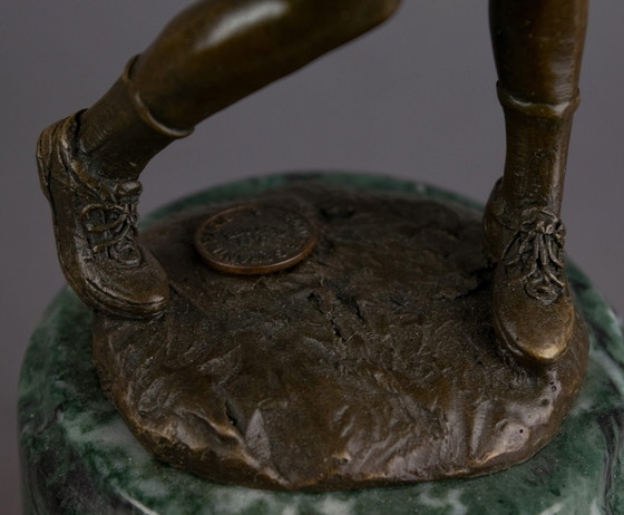 Image 1 of Bronzen Golfspeelster Beeld