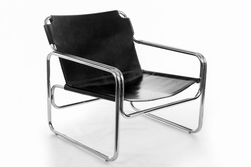 2x Vintage tuigleer fauteuils