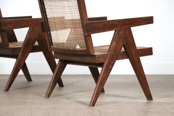 Image 1 of Pierre Jeanneret Loungestoelen met zwevende rug in teak en riet, 1950