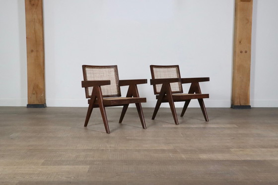 Image 1 of Pierre Jeanneret Loungestoelen met zwevende rug in teak en riet, 1950