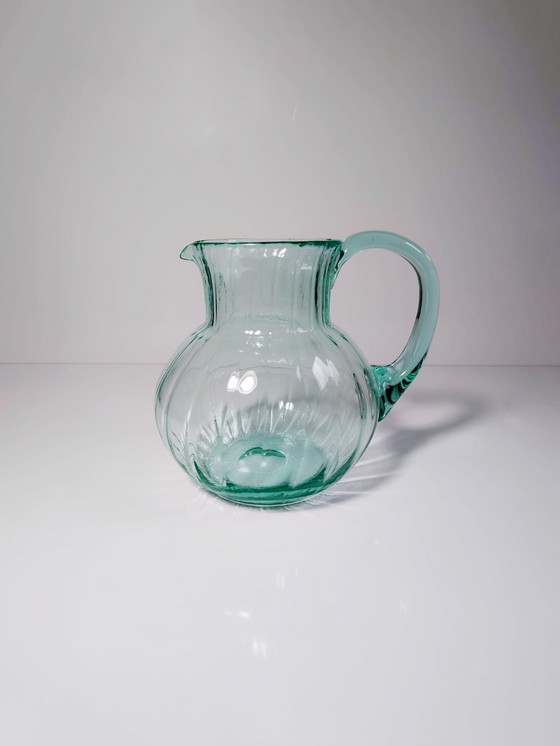 Image 1 of Vintage glazen karaf Beryl turquoise Mid Century Murano Swirl karaf Uranium glas