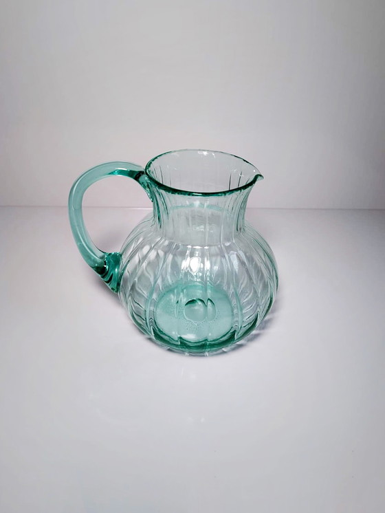 Image 1 of Vintage glazen karaf Beryl turquoise Mid Century Murano Swirl karaf Uranium glas