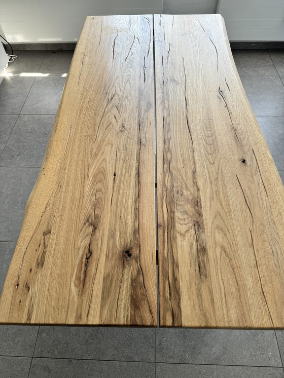 Image 1 of Design houten tafel met glazen onderkant