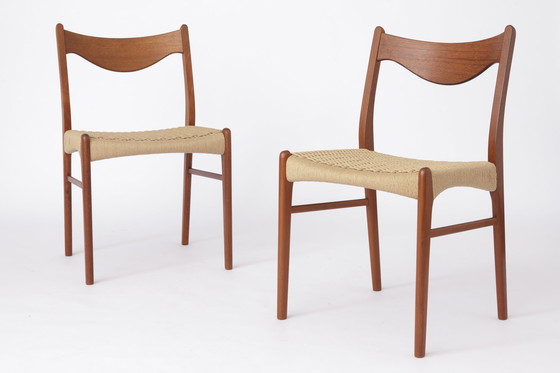 Image 1 of 2x Arne Wahl Iversen eetkamerstoelen Denemarken jaren 60-70