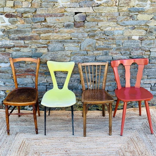 Set van 4 vintage stoelen van hout, metaal en kunststof