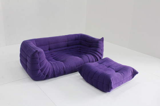 Image 1 of Ligne Roset Togo Sofa Met Armleuningen En Poef Van Michel Ducaroy